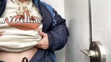 Student girl gets horny in toilet and grabs breasts