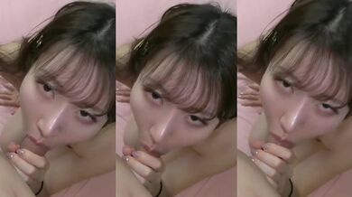 フェラチオされた後の日本の少女の口は精液でいっぱいです