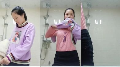 Sister takes off her clothes in the bathroom and plays with her breasts