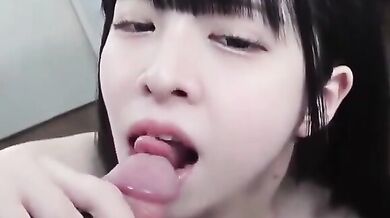 Big-Breasted Bunny-Toothed Girl Gives a Blowjob