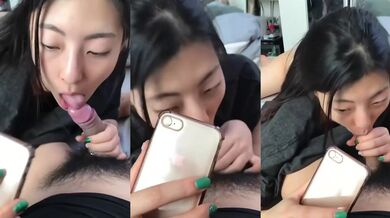 Woman Eats While Distracted by Phone