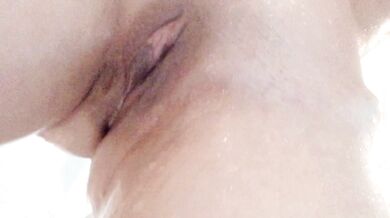 Girl taking a selfie in the bath