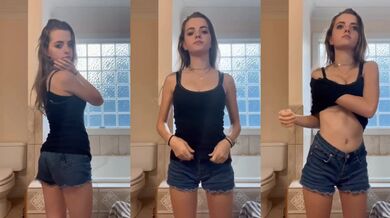 Foreign little fan girl takes off her clothes and takes a selfie in front of the camera